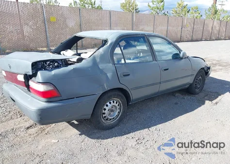 1996 Toyota Corolla Dx z USA, uszkodzony, nr VIN 1NXBB02E4TZ396521